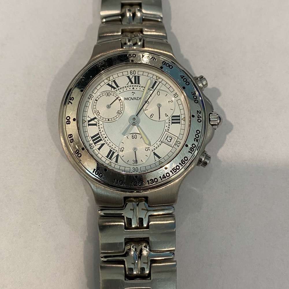 Movado quartz link band watch with crystal face